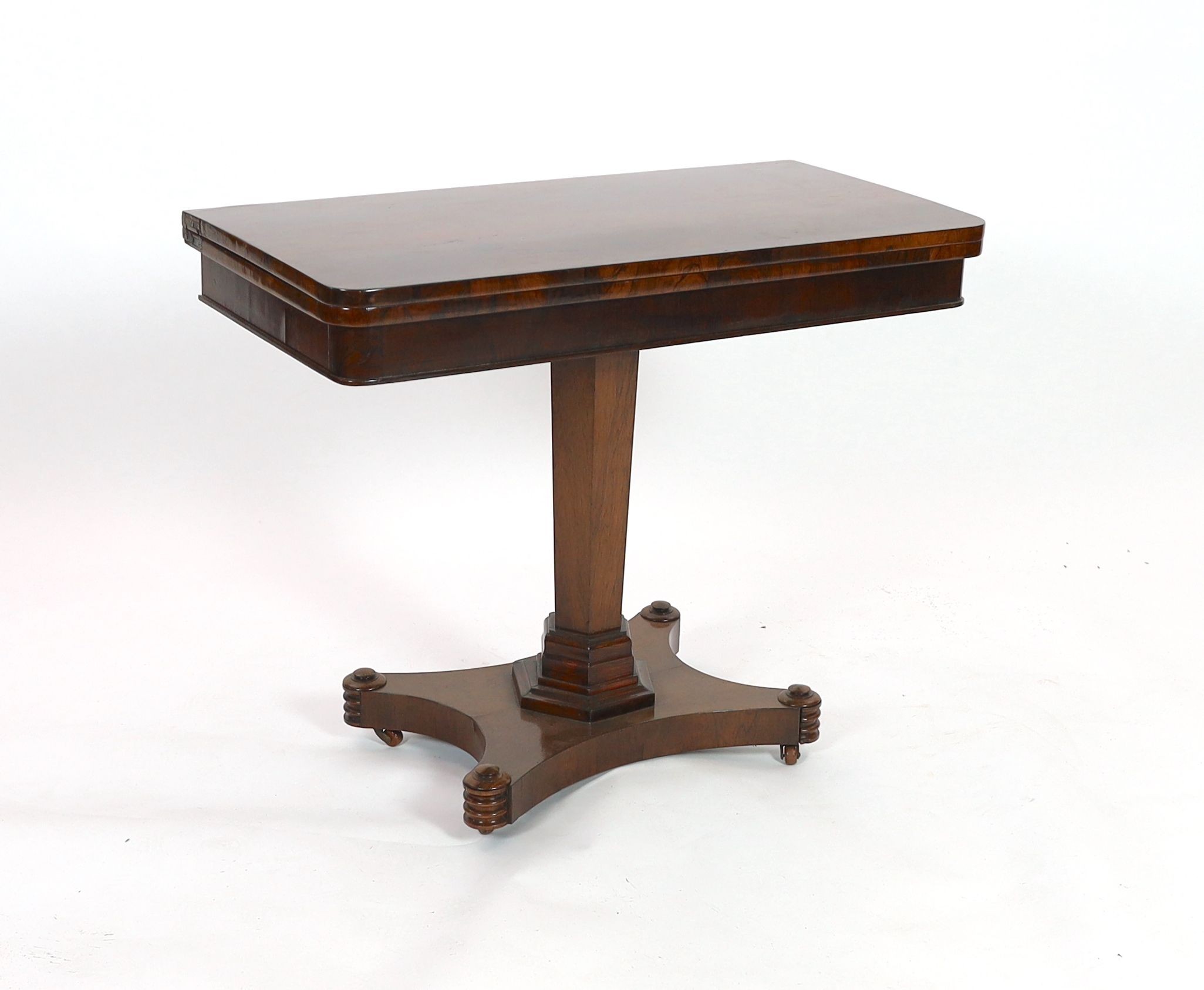 An early Victorian rectangular rosewood folding card table, on hexagonal column, width 92cm depth 46cm height 73cm